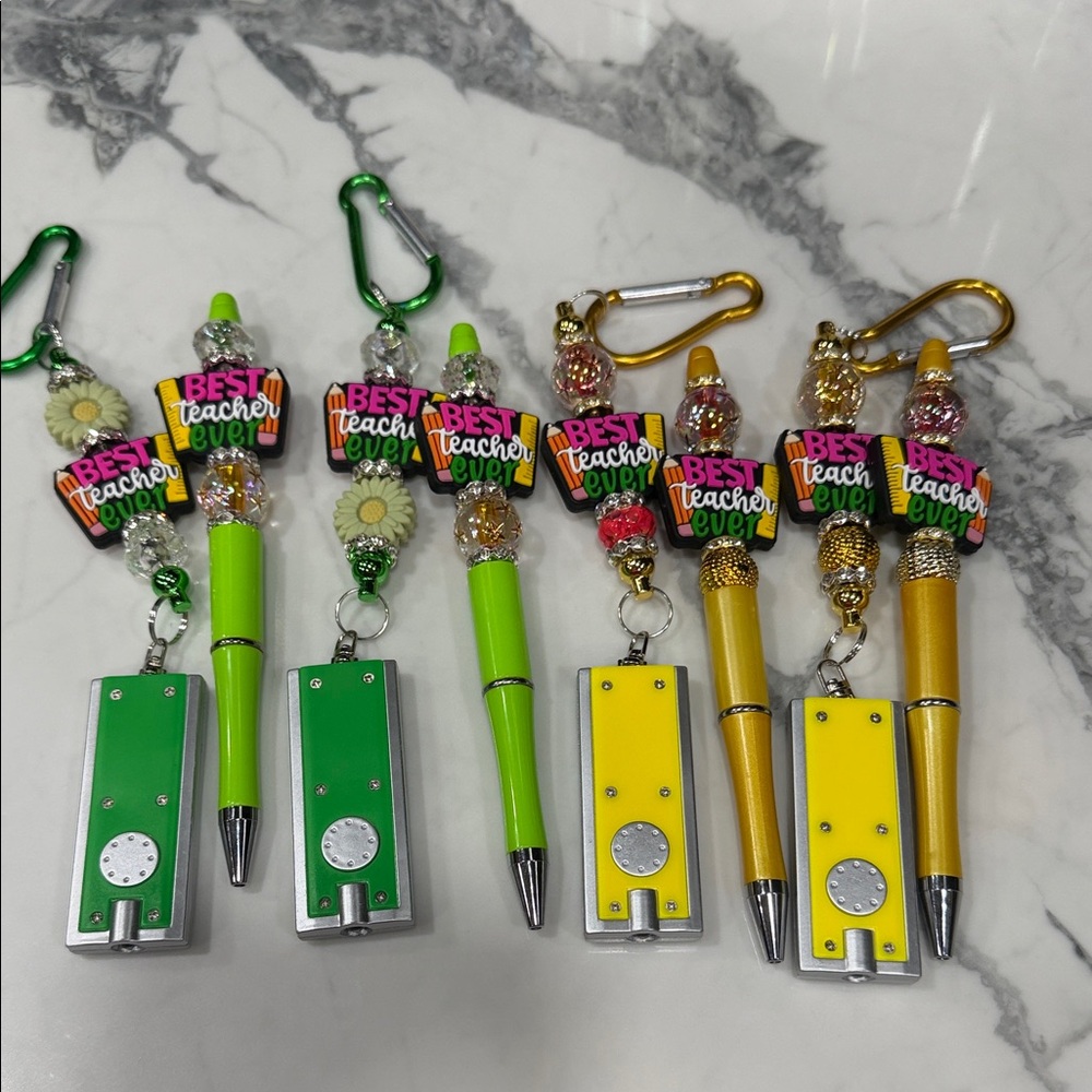 “Best Teacher Ever,” beaded keychain/pen sets. Show your teacher appreciation.